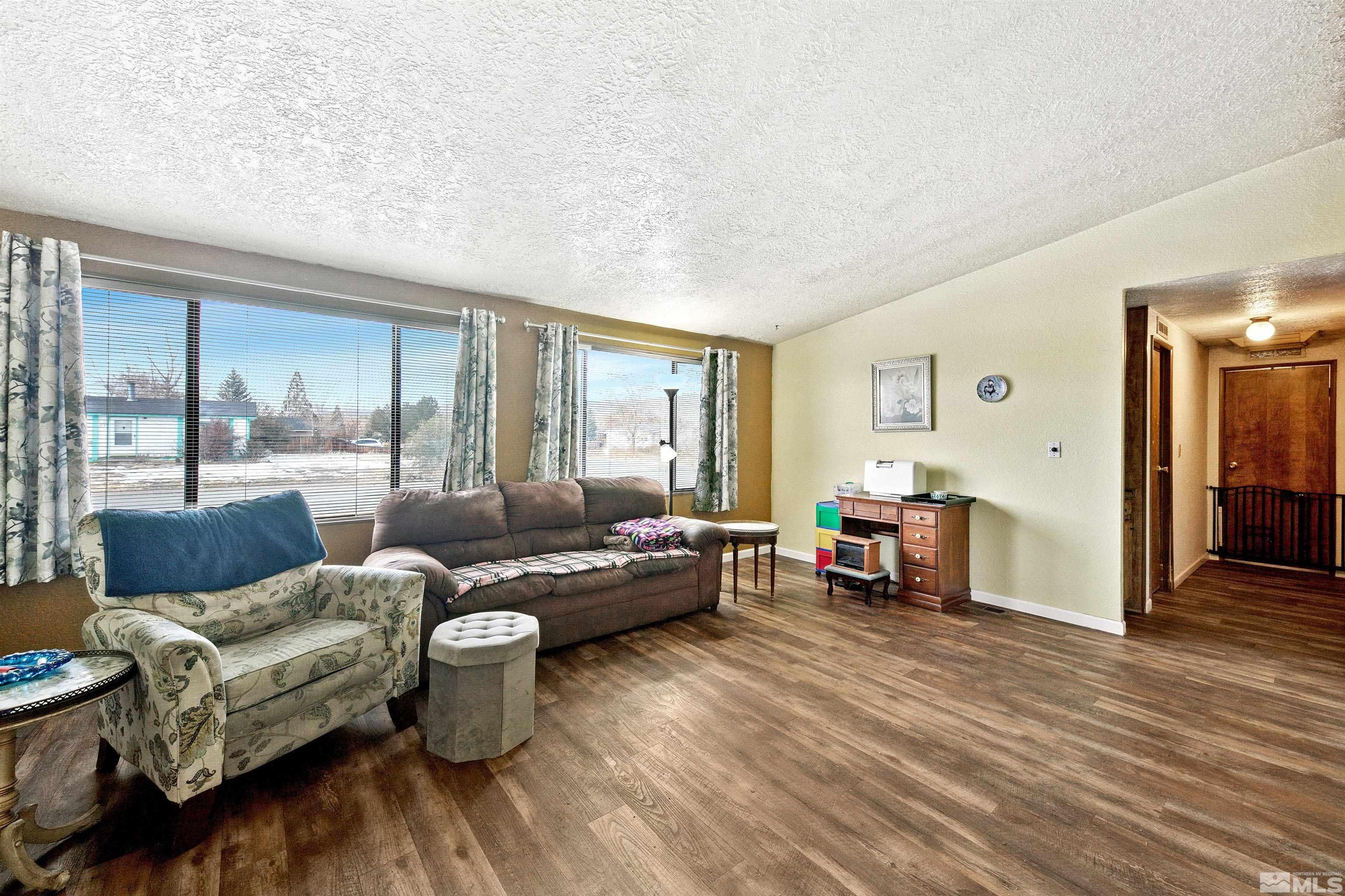 17405 Sunbird Lane Reno, NV 89508 - Photo 13 of 18 a living room with furniture and wooden floor