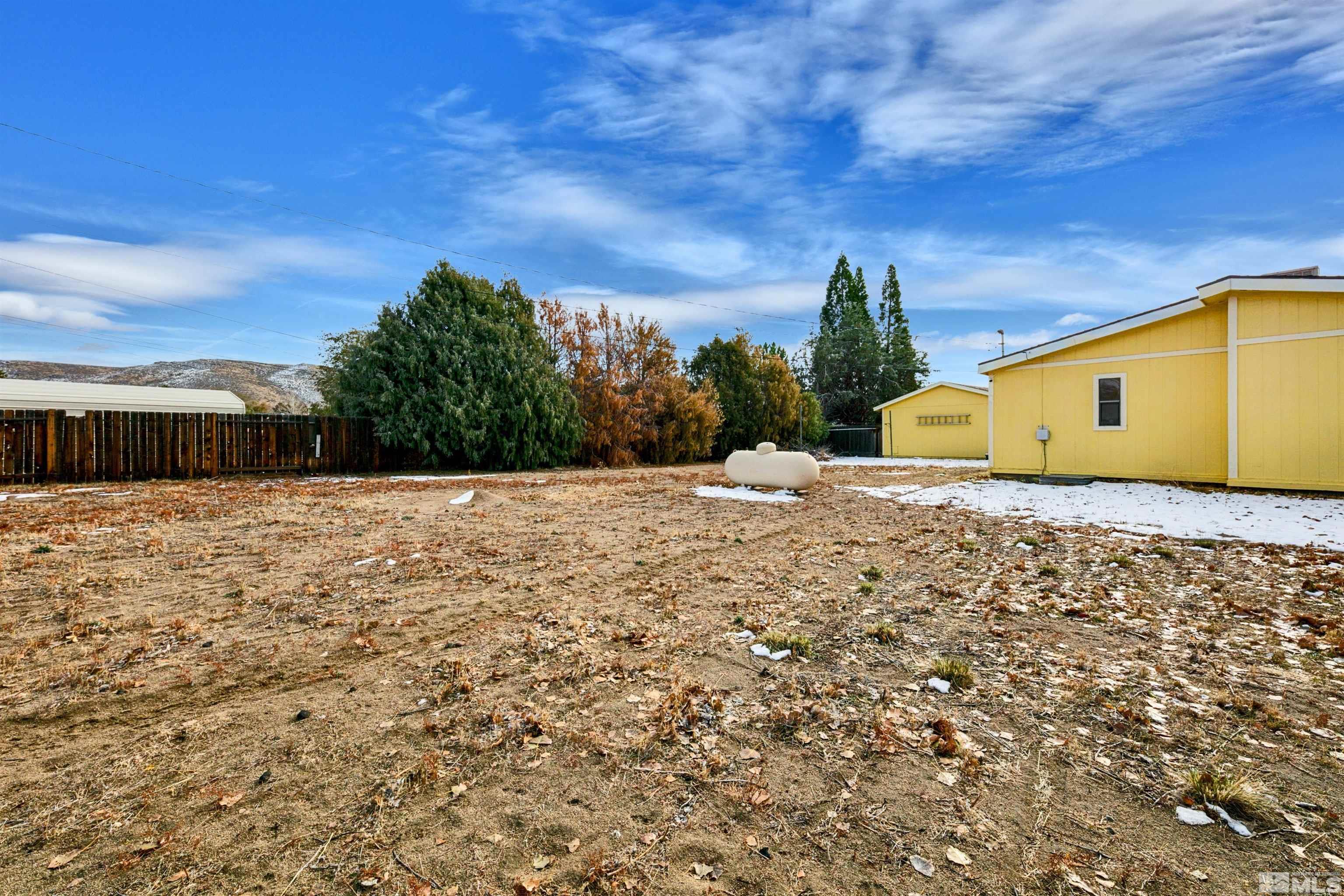 17405 Sunbird Lane Reno, NV 89508 - Photo 5 of 18 a view of a house with a yard