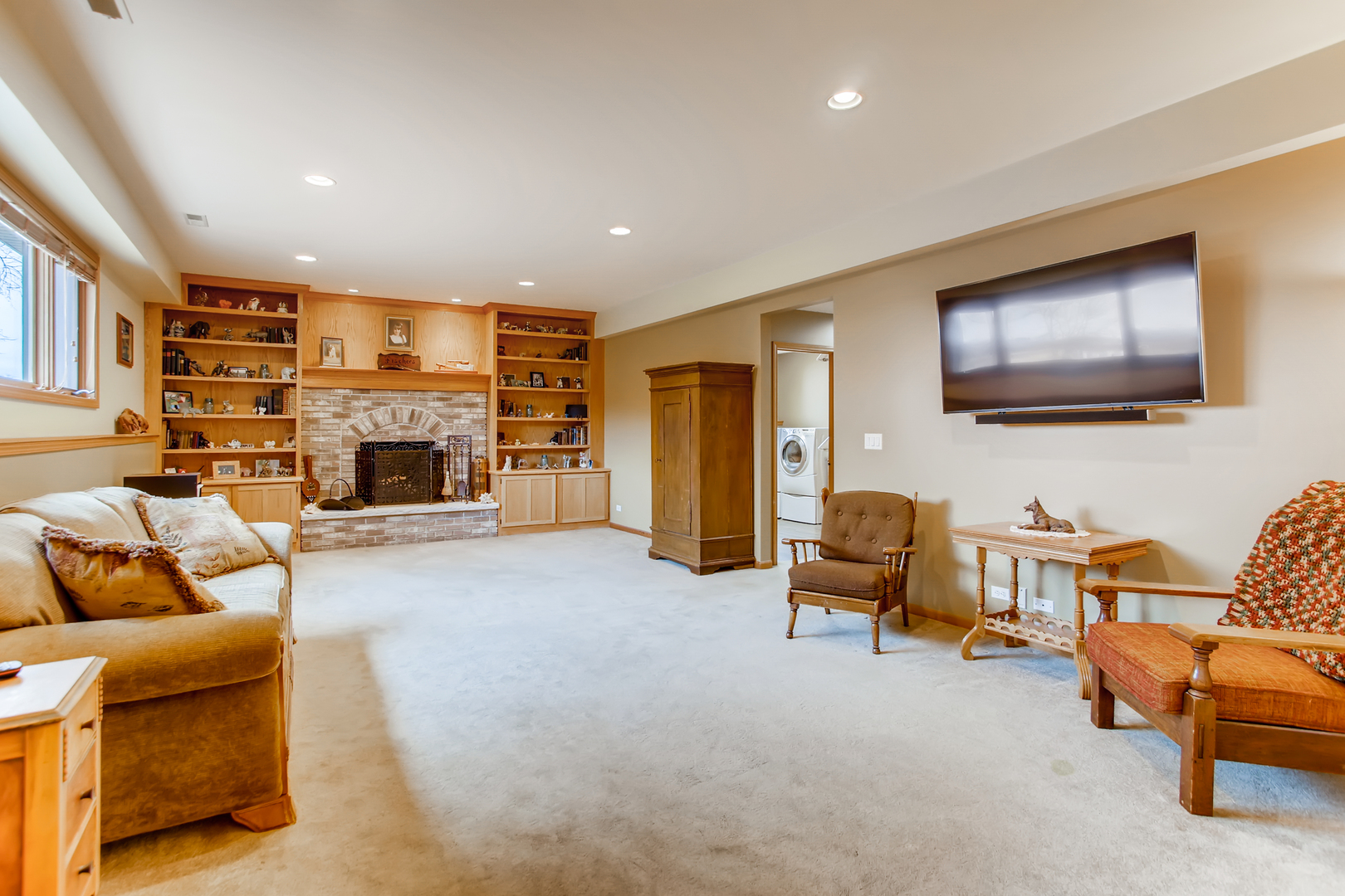 2N706 Howard Road Maple Park, IL 60151 - Photo 23 of 40 a living room with furniture and a fireplace