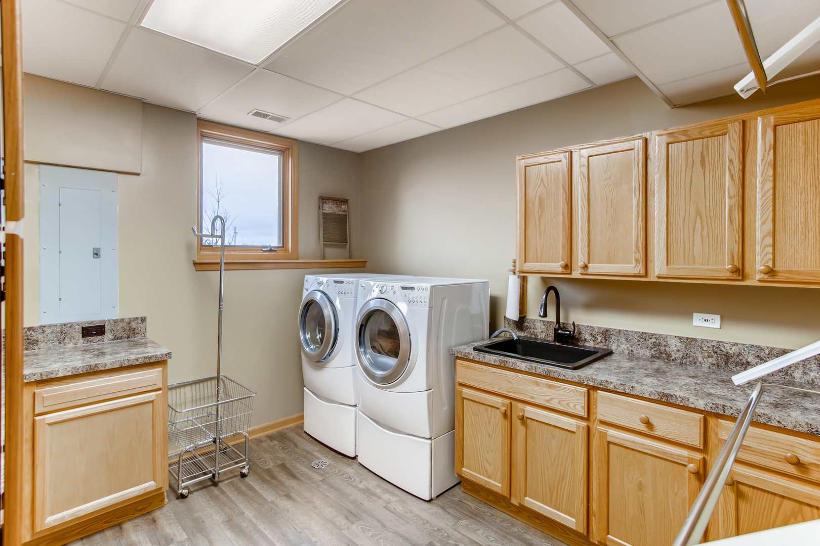 2N706 Howard Road Maple Park, IL 60151 - Photo 26 of 40 a utility room with sink dryer and washer