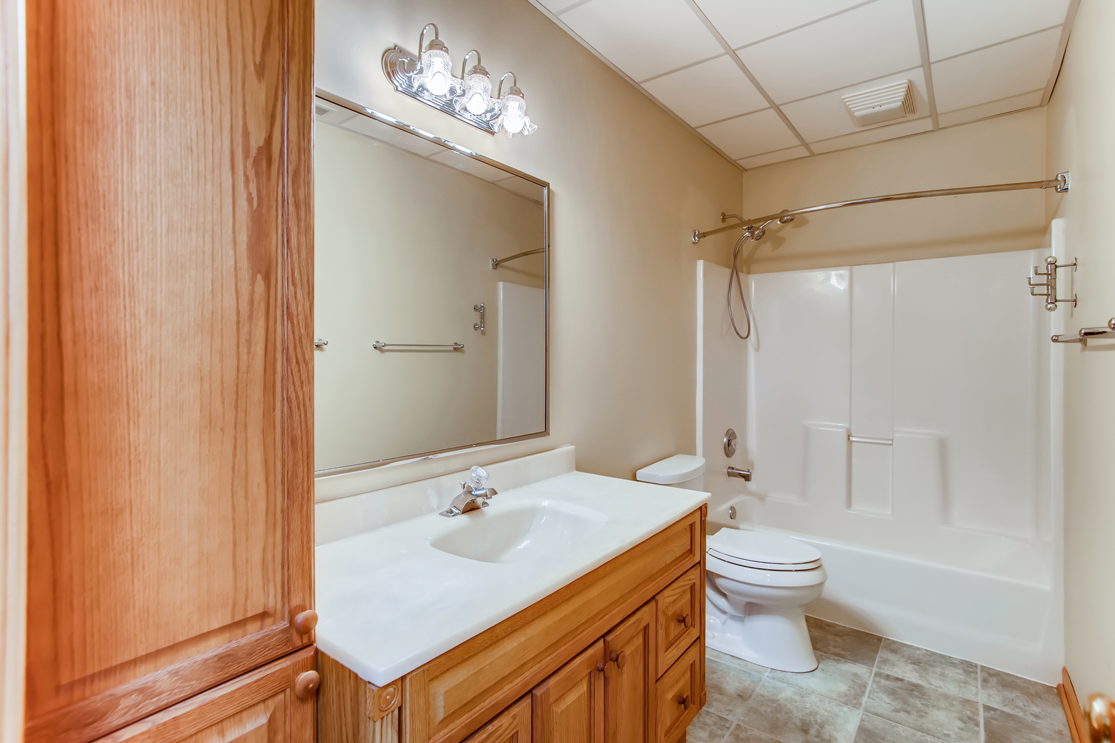 2N706 Howard Road Maple Park, IL 60151 - Photo 29 of 40 a bathroom with a sink toilet a shower and a mirror