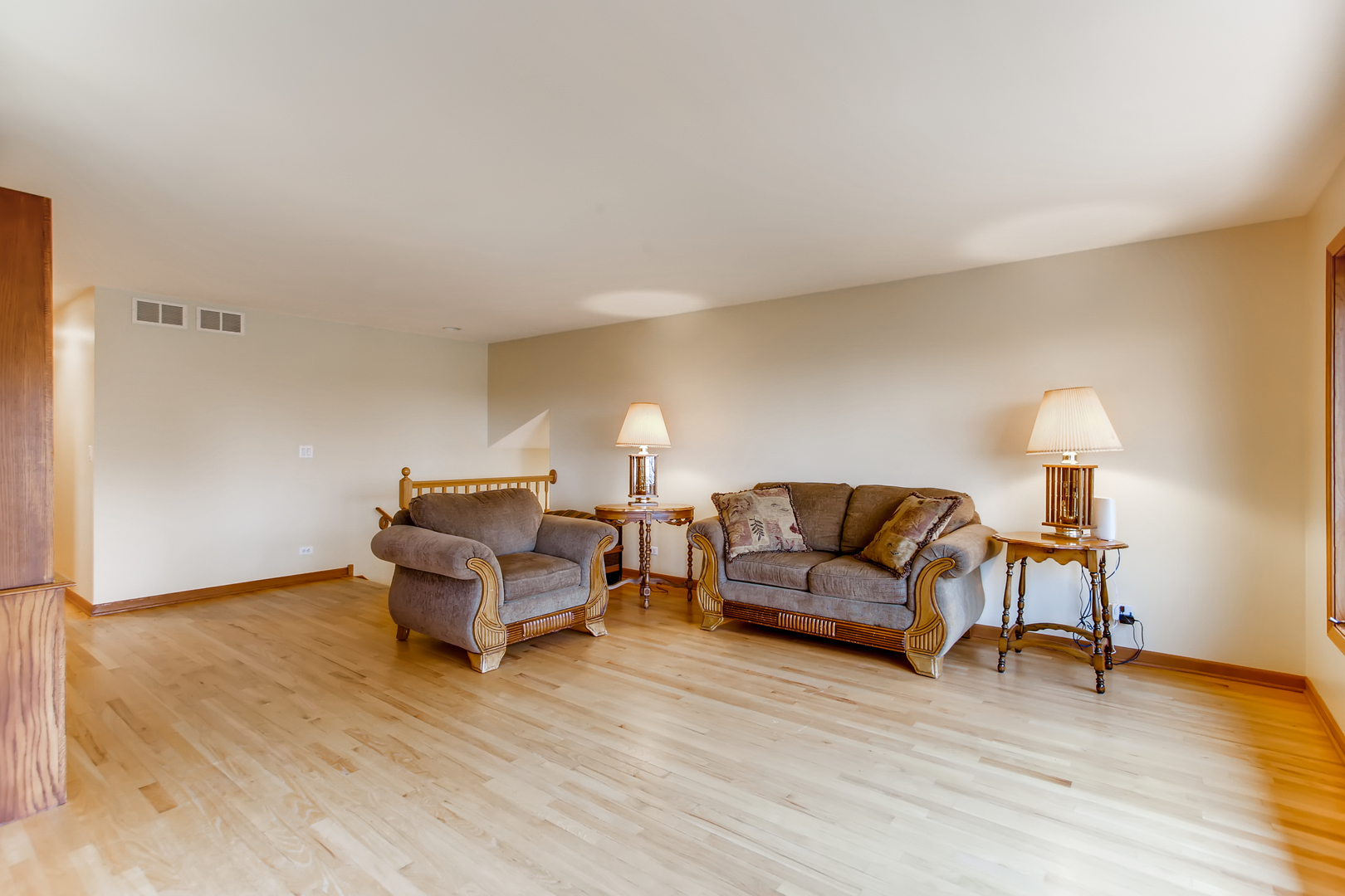 2N706 Howard Road Maple Park, IL 60151 - Photo 9 of 40 a living room with furniture and a wooden floor
