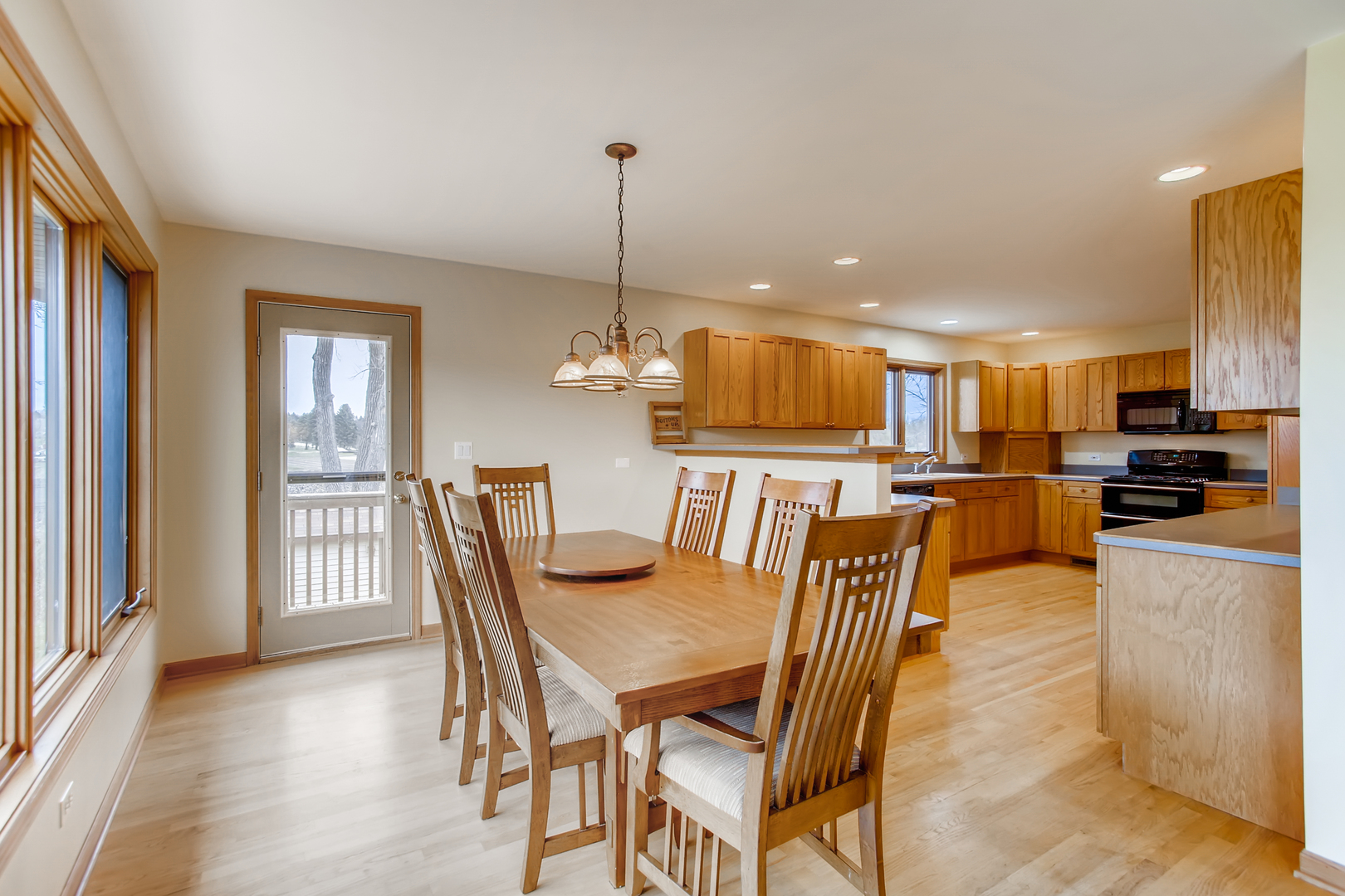 2N706 Howard Road Maple Park, IL 60151 - Photo 10 of 40 a dining room with furniture and wooden floor