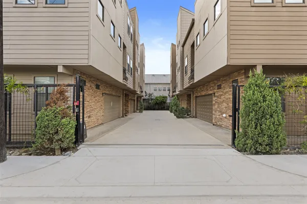 a white building with an outdoor space