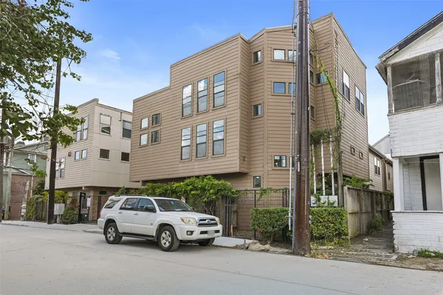 a car parked in front of a building