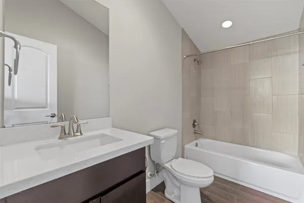 a bathroom with a sink and mirror