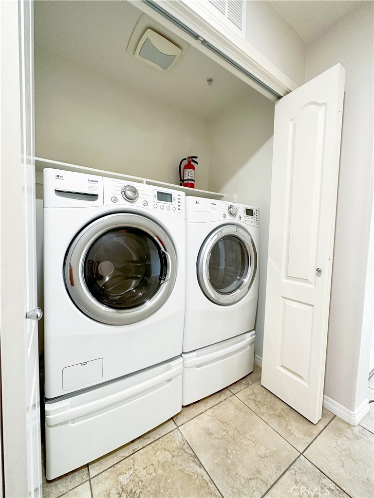 30 Pink Sage Irvine, CA 92620 - Photo 5 of 11 a utility room with dryer and washer