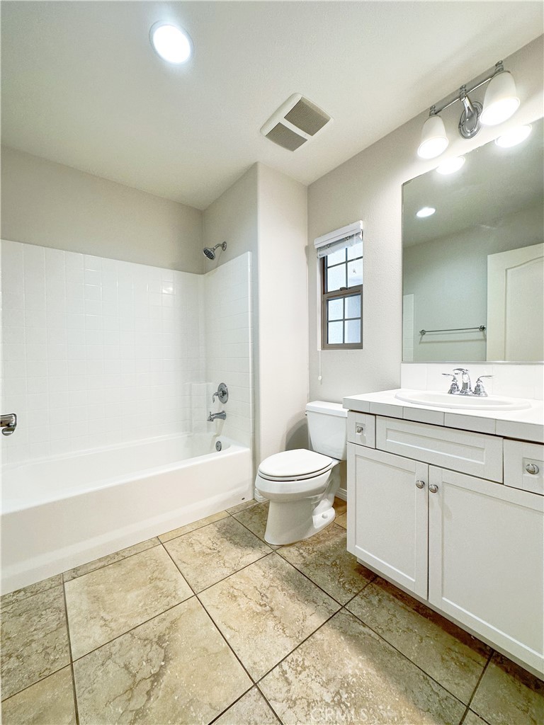 30 Pink Sage Irvine, CA 92620 - Photo 6 of 11 a bathroom with a sink a toilet and a bathtub