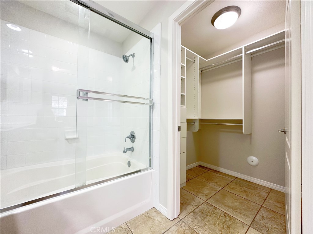 30 Pink Sage Irvine, CA 92620 - Photo 10 of 11 a bathroom with a bathtub and a shower
