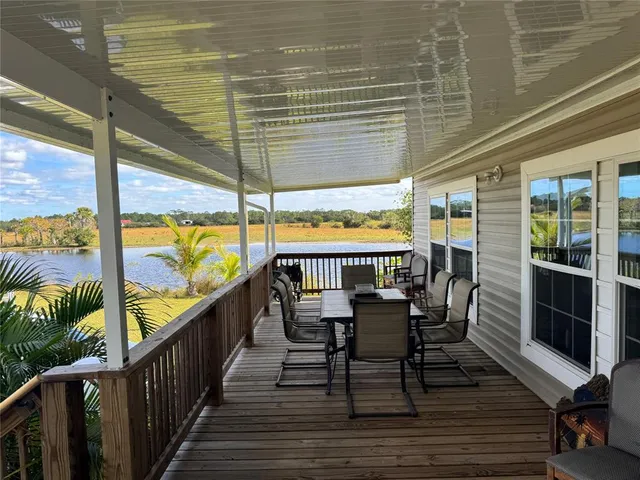 a view of a balcony with chairs