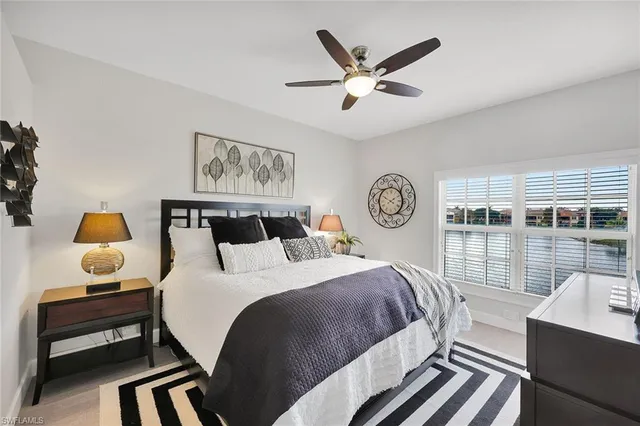 a bathroom with a double sink shower and a mirror