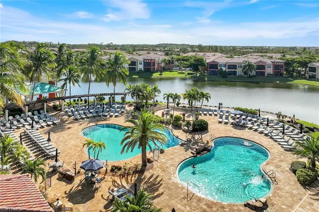 a view of a swimming pool with a terrace