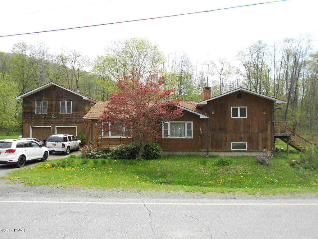 85 Elk Brook Road Road Delhi, NY 13753 - Photo 1 of 11 a view of a house with a yard