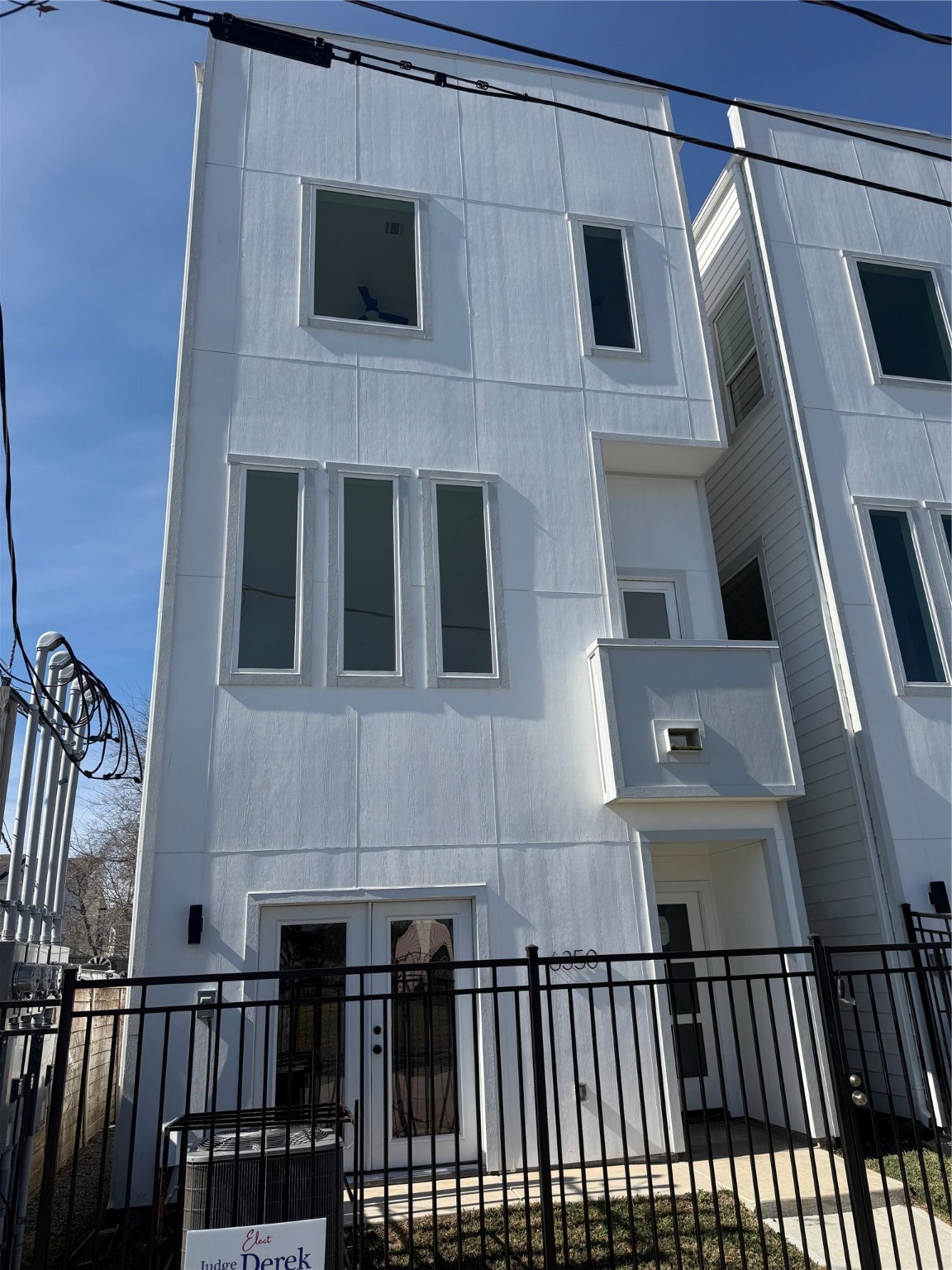 a view of a balcony with wooden floor