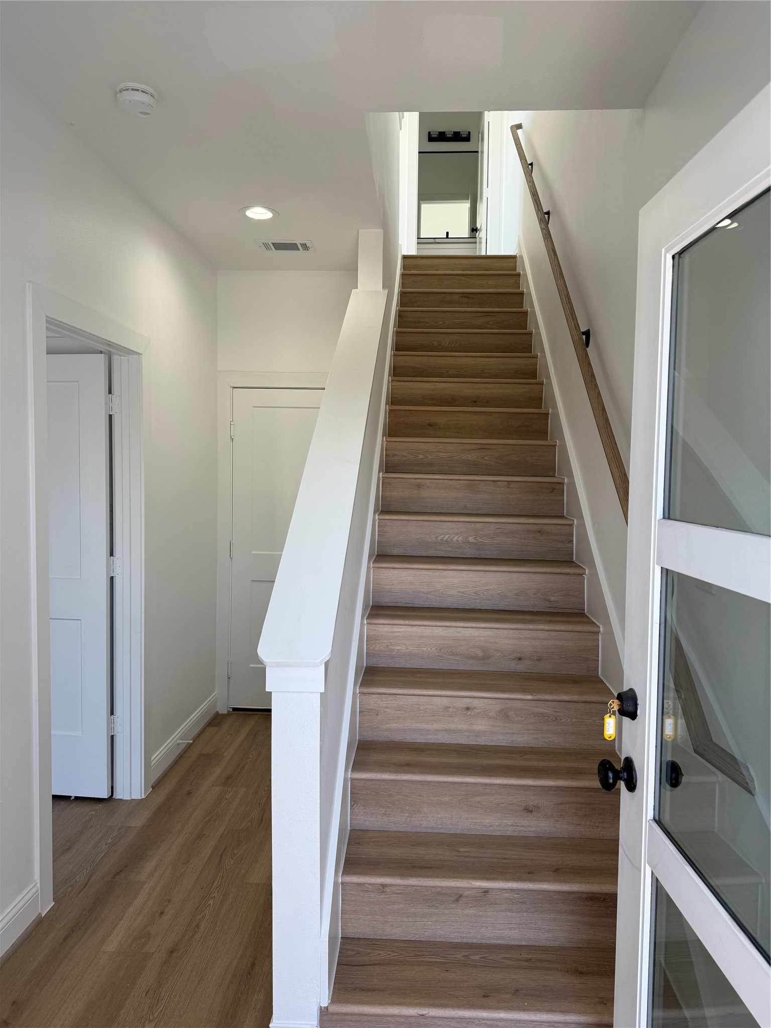 6350 Culberson Street Houston, TX 77021 - Photo 12 of 37 a view of entryway and hall with wooden floor