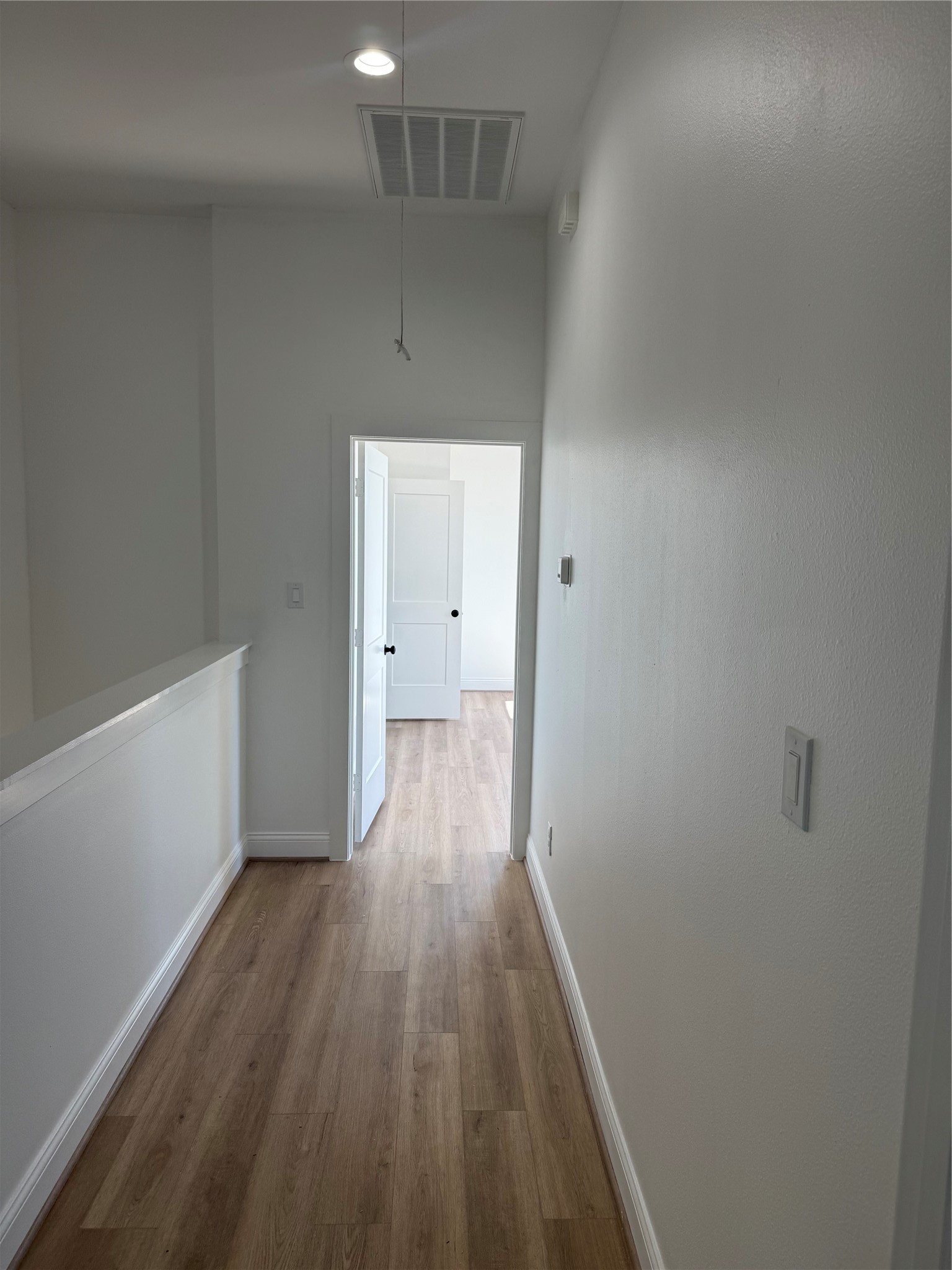 6350 Culberson Street Houston, TX 77021 - Photo 26 of 37 a view of a hallway with wooden floor