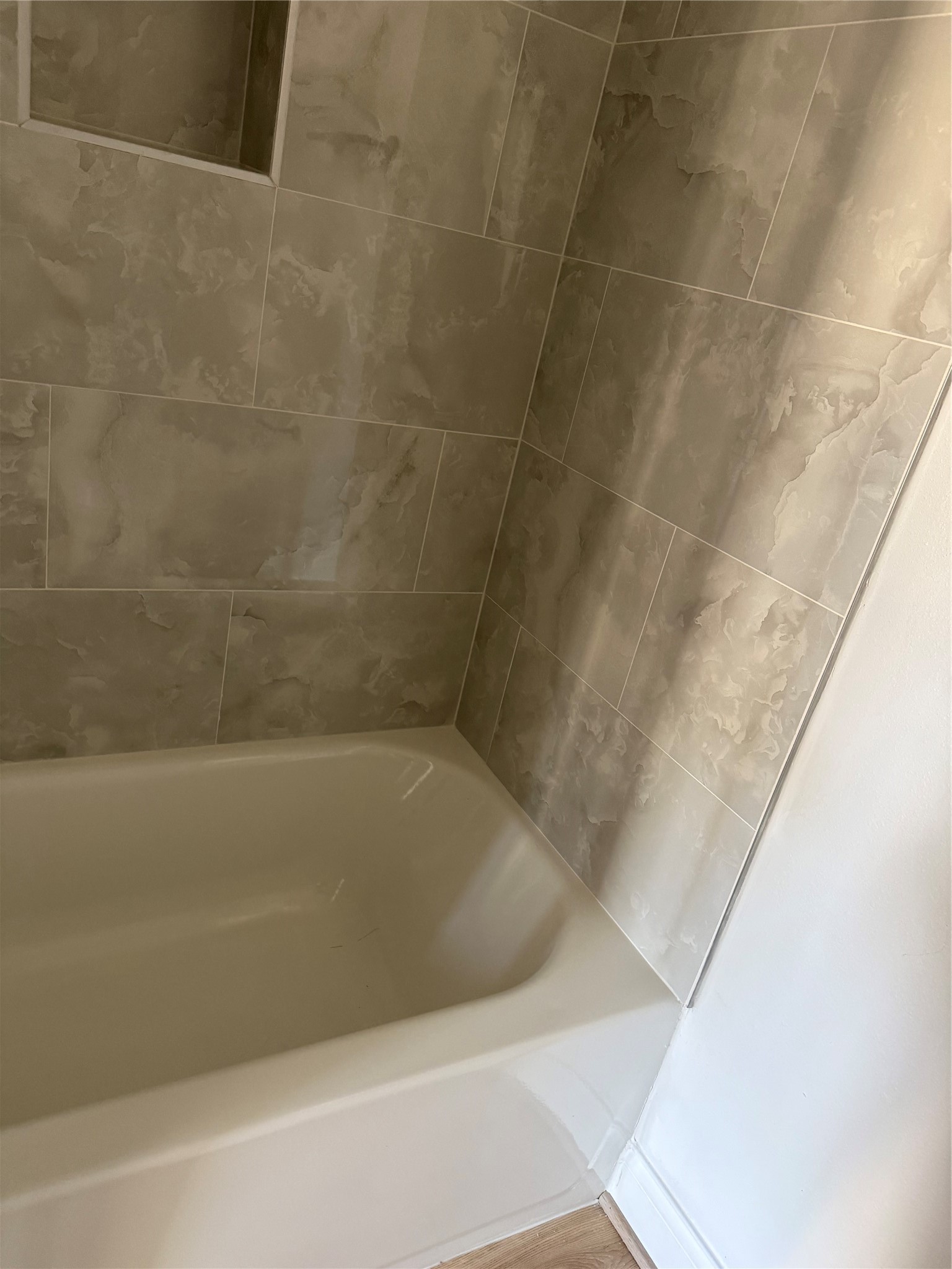 6350 Culberson Street Houston, TX 77021 - Photo 9 of 37 a close up of a bathtub in a bathroom