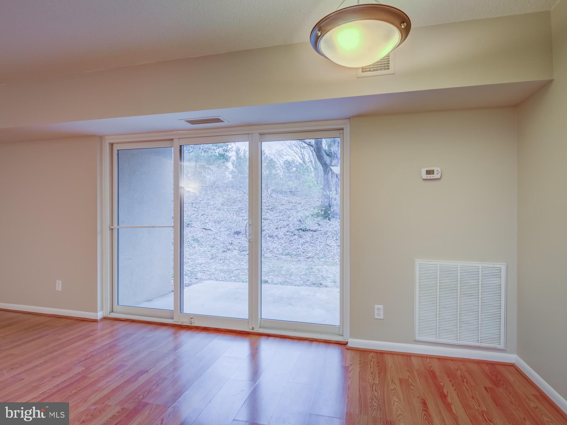 2243 Castle Rock Square, Unit 1B Reston, VA 20191 - Photo 13 of 20 Dining Area Walks Out to Private Patio