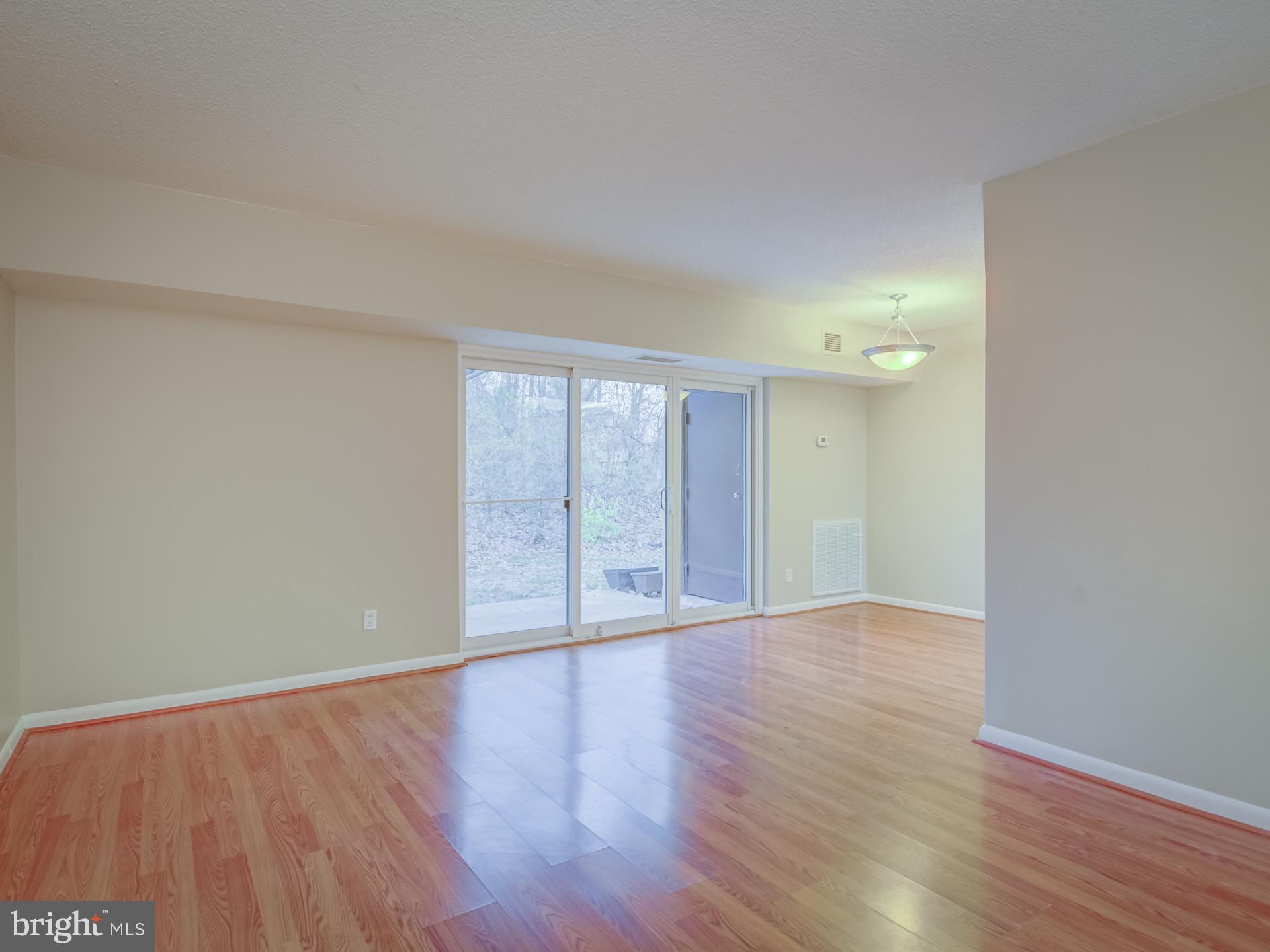 2243 Castle Rock Square, Unit 1B Reston, VA 20191 - Photo 9 of 20 Living/Dining Combo