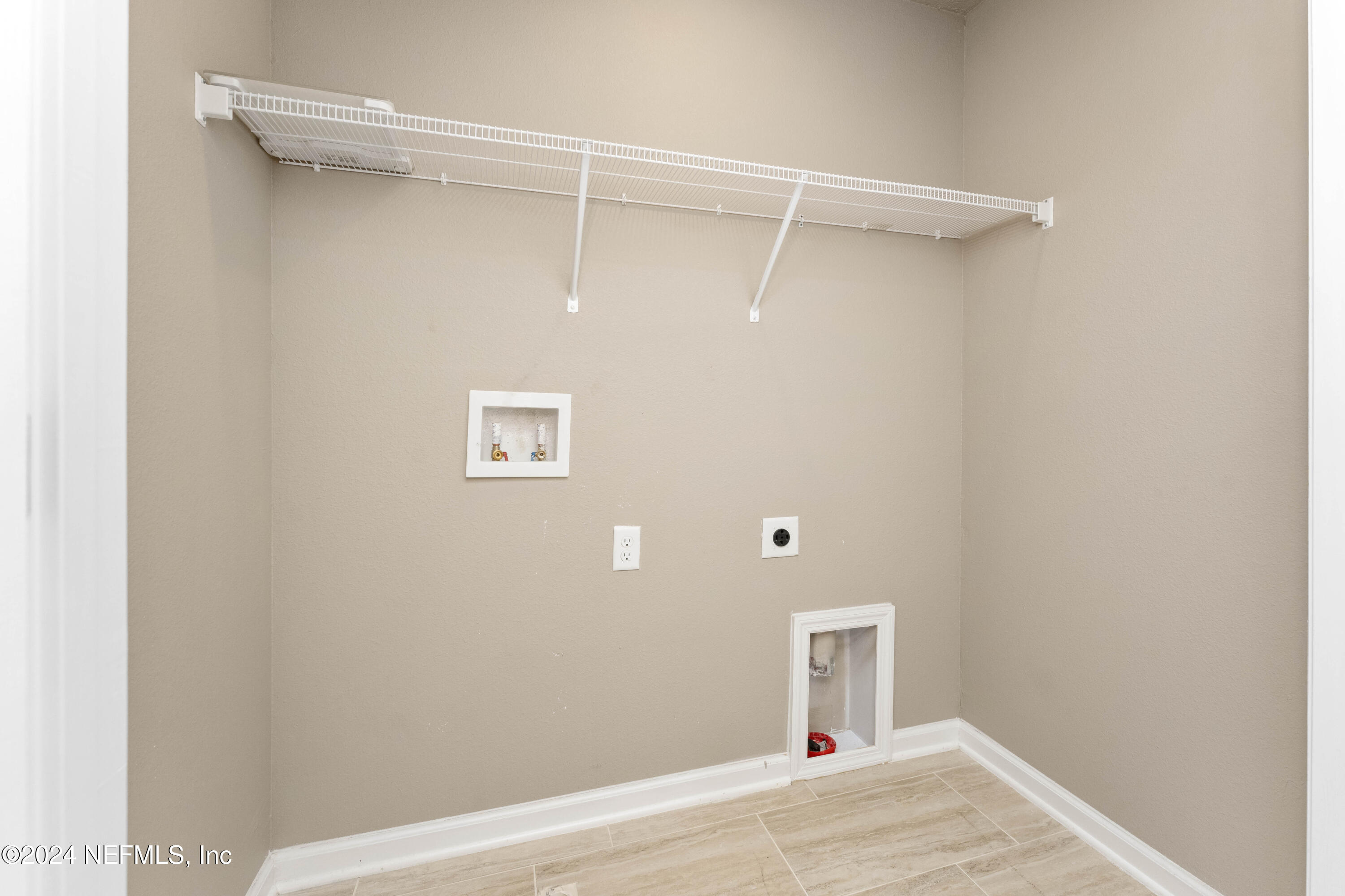 7716 Merchants Way Jacksonville, FL 32222 - Photo 18 of 27 20 upstairs laundry