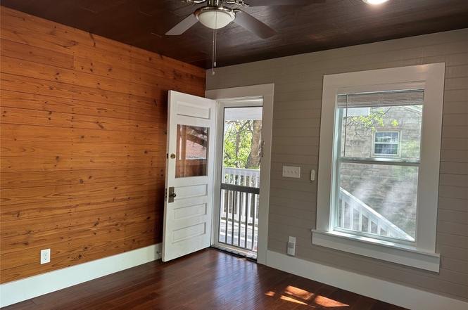 1223 1/2 South Austin Avenue Georgetown, TX 78626 - Photo 15 of 39 a view of empty room with wooden floor and fan