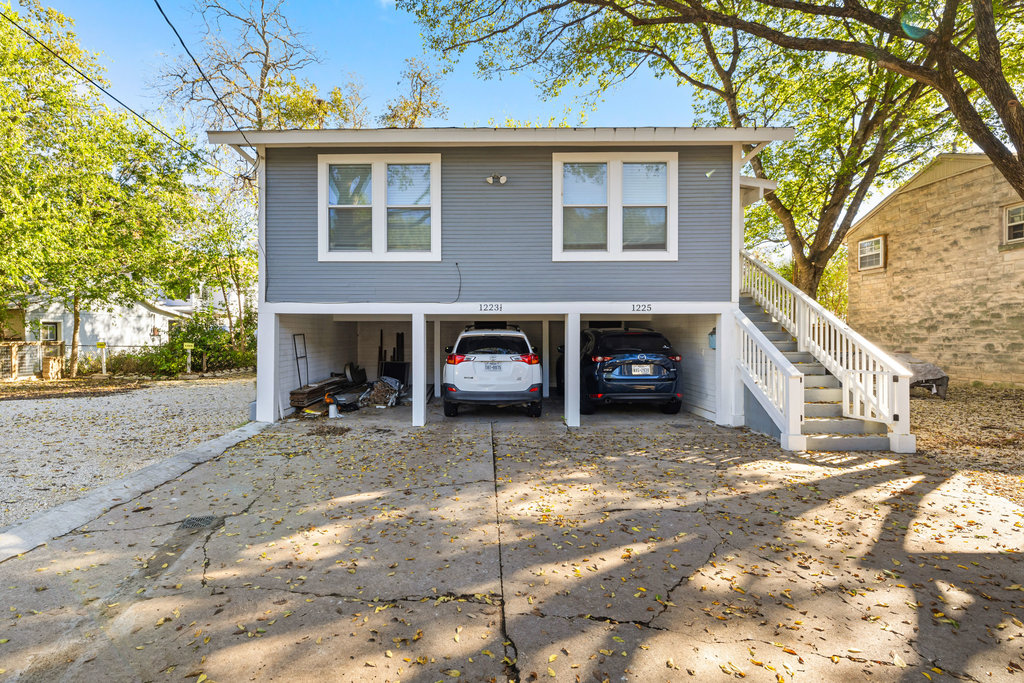 1223 1/2 South Austin Avenue Georgetown, TX 78626 - Photo 23 of 39 a view of a house with a yard and sitting area
