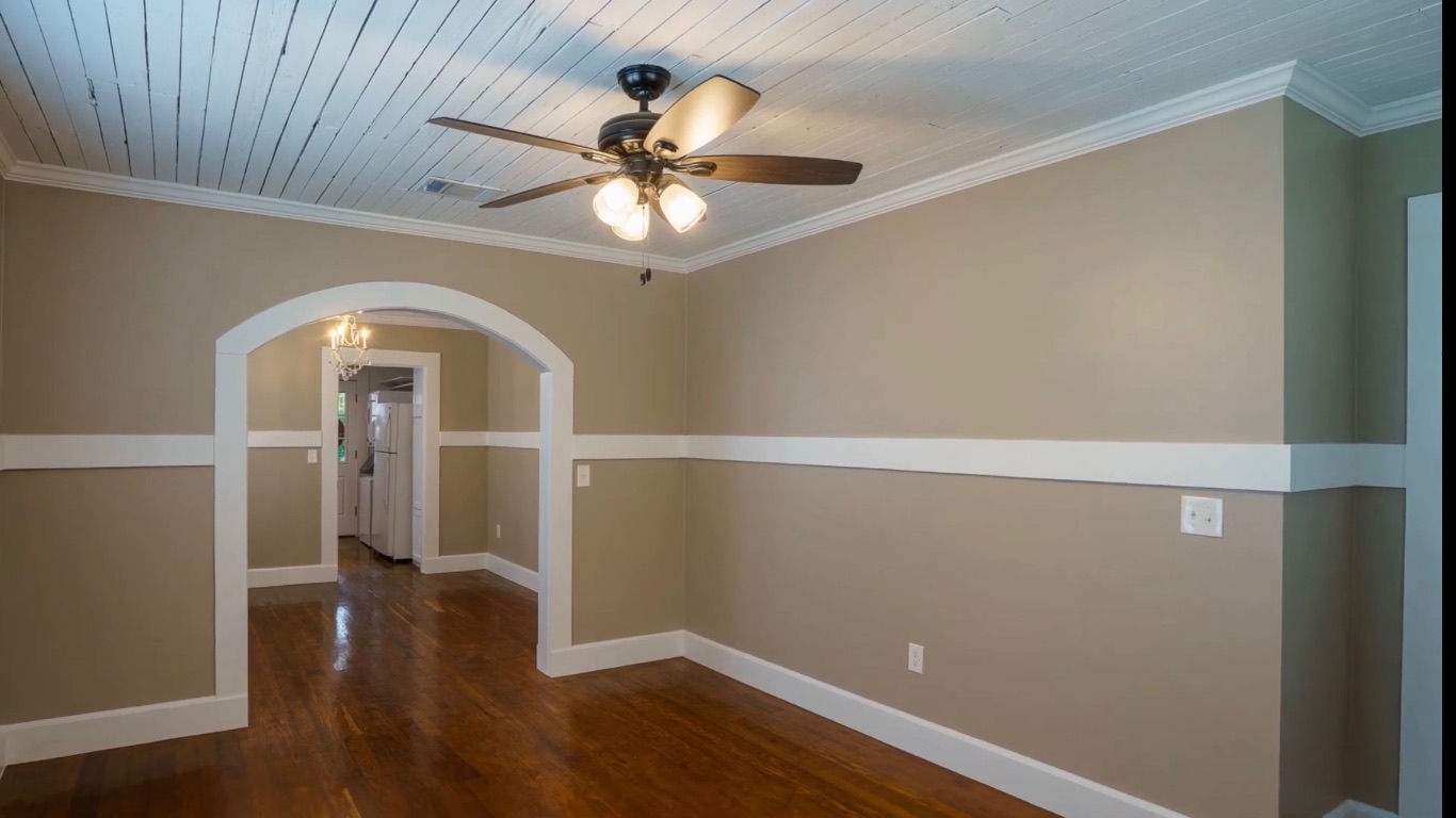 1223 1/2 South Austin Avenue Georgetown, TX 78626 - Photo 30 of 39 wooden floor in an empty room with a window