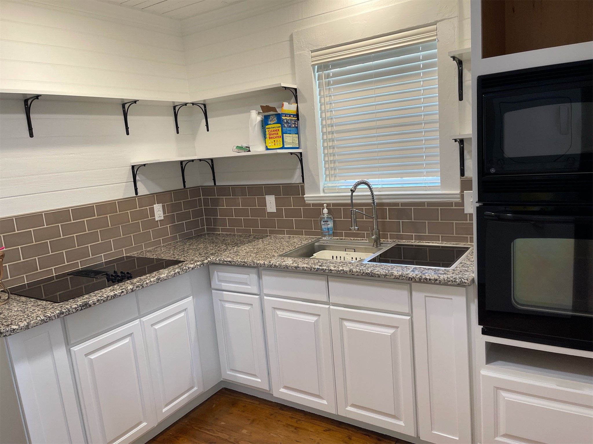1223 1/2 South Austin Avenue Georgetown, TX 78626 - Photo 33 of 39 a kitchen that has a sink and a stove