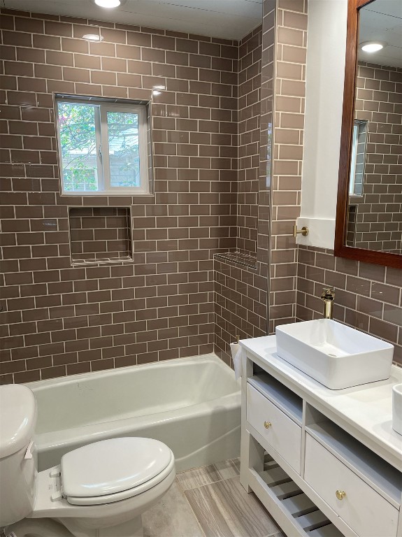 1223 1/2 South Austin Avenue Georgetown, TX 78626 - Photo 36 of 39 a bathroom with a sink a toilet and bathtub