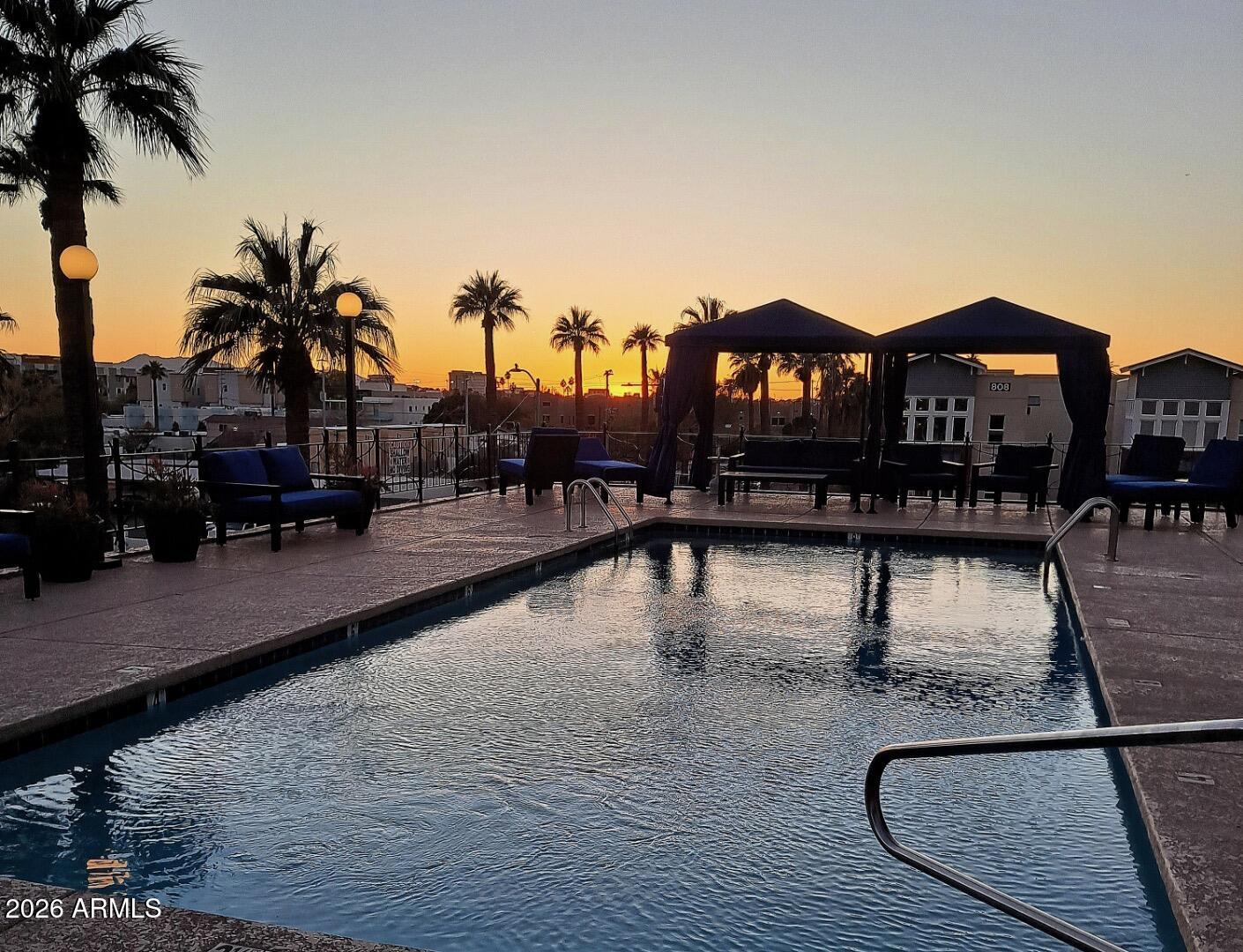 805 North 4th Avenue, Unit 609 Phoenix, AZ 85003 - Photo 26 of 34 a view of a swimming pool with a bench