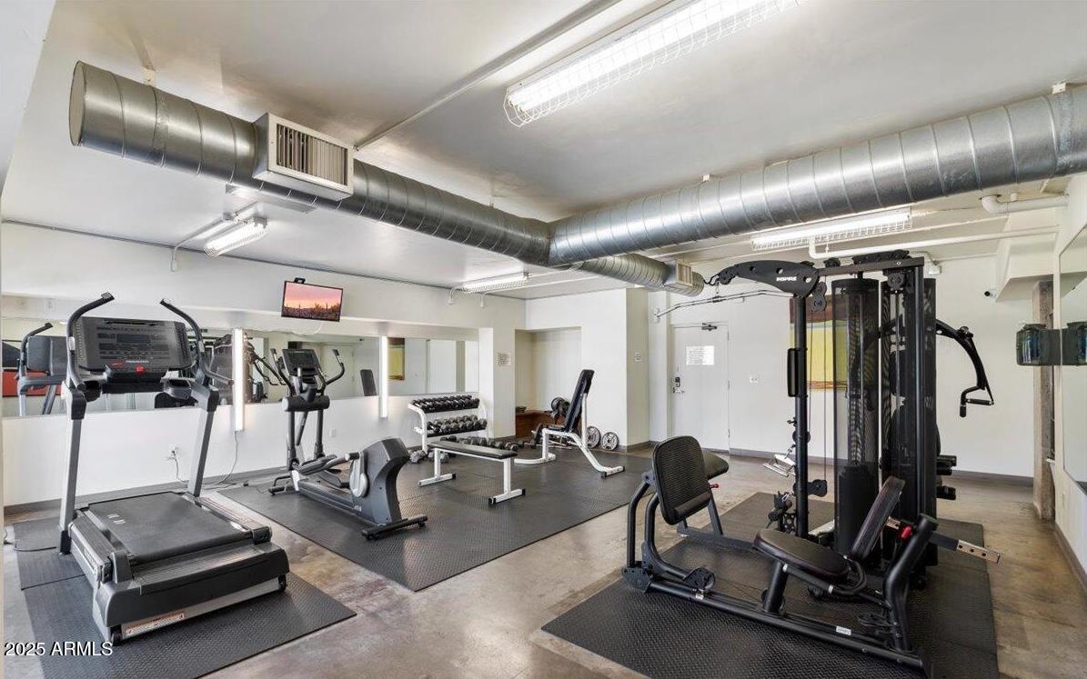 805 North 4th Avenue, Unit 609 Phoenix, AZ 85003 - Photo 29 of 34 a view of a room with gym equipment
