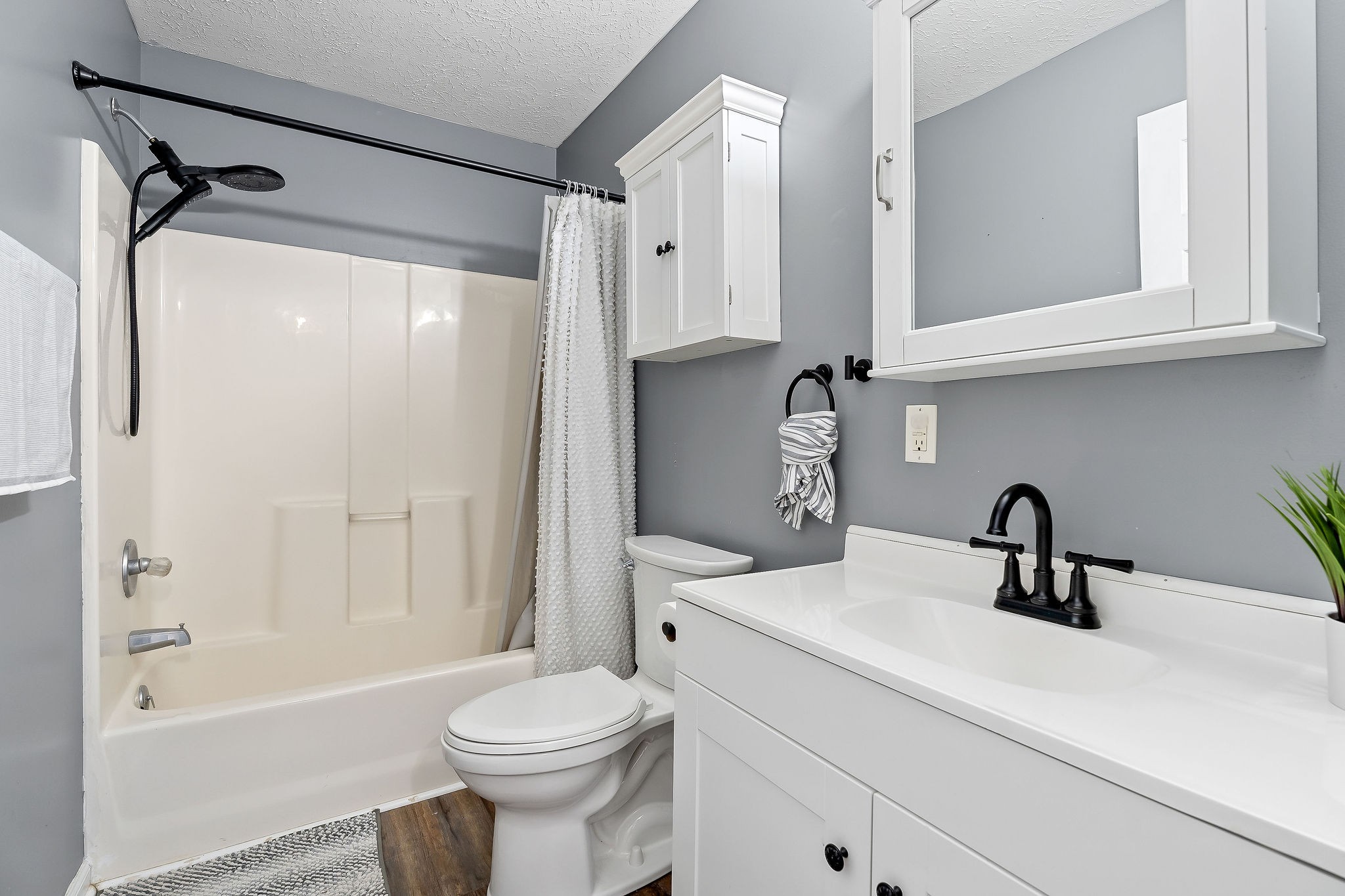 249 Darlene Drive Sparta, TN 38583 - Photo 11 of 21 a bathroom with a sink a toilet and a bathtub