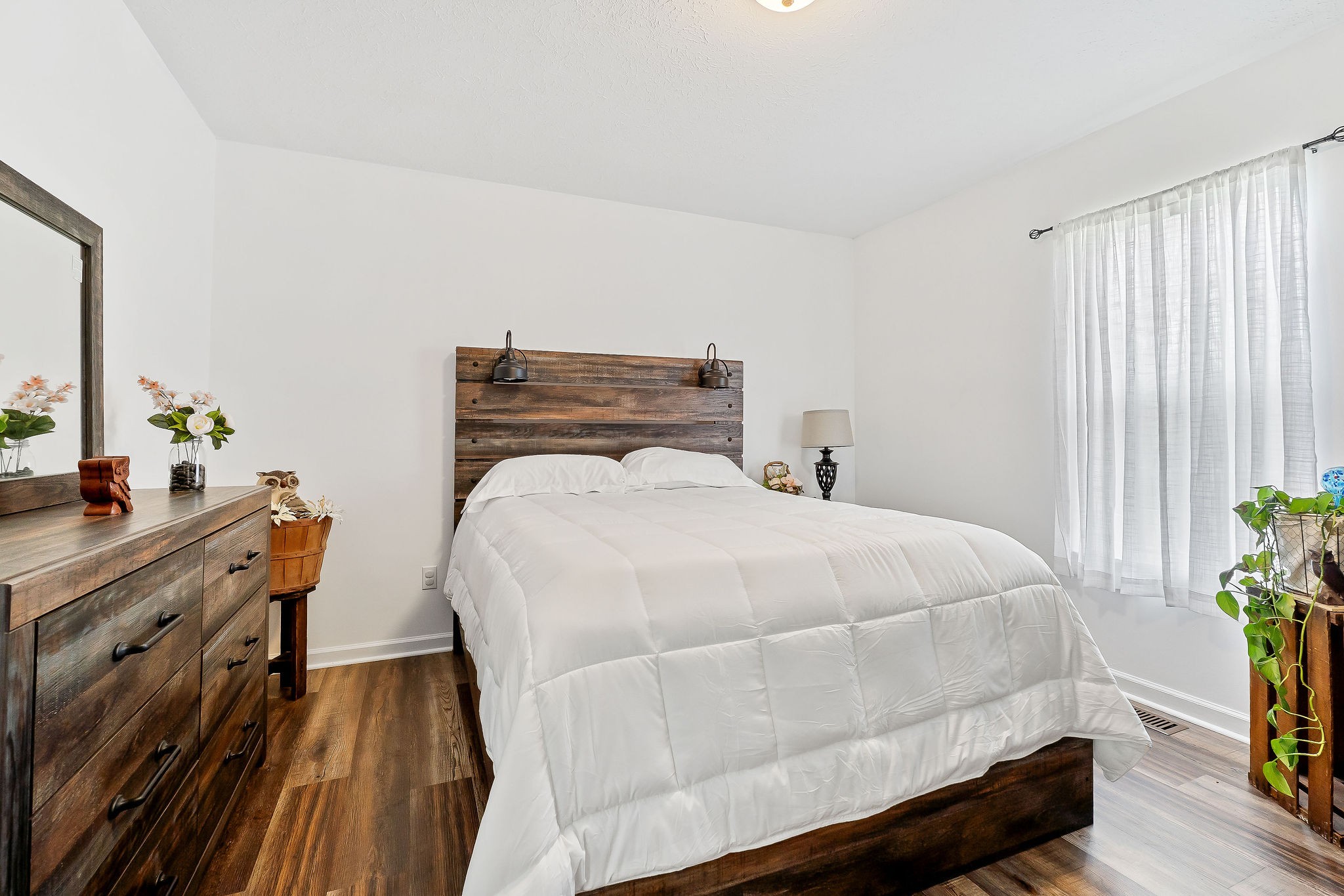 249 Darlene Drive Sparta, TN 38583 - Photo 12 of 21 a bed sitting in a bedroom next to a window