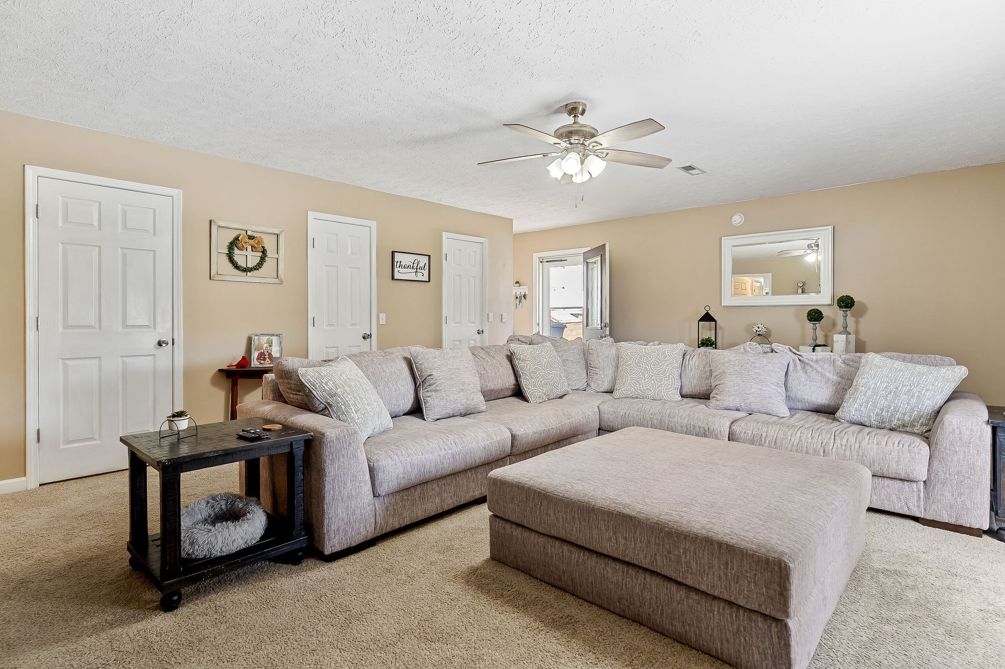 249 Darlene Drive Sparta, TN 38583 - Photo 17 of 21 a living room with furniture and a ceiling fan