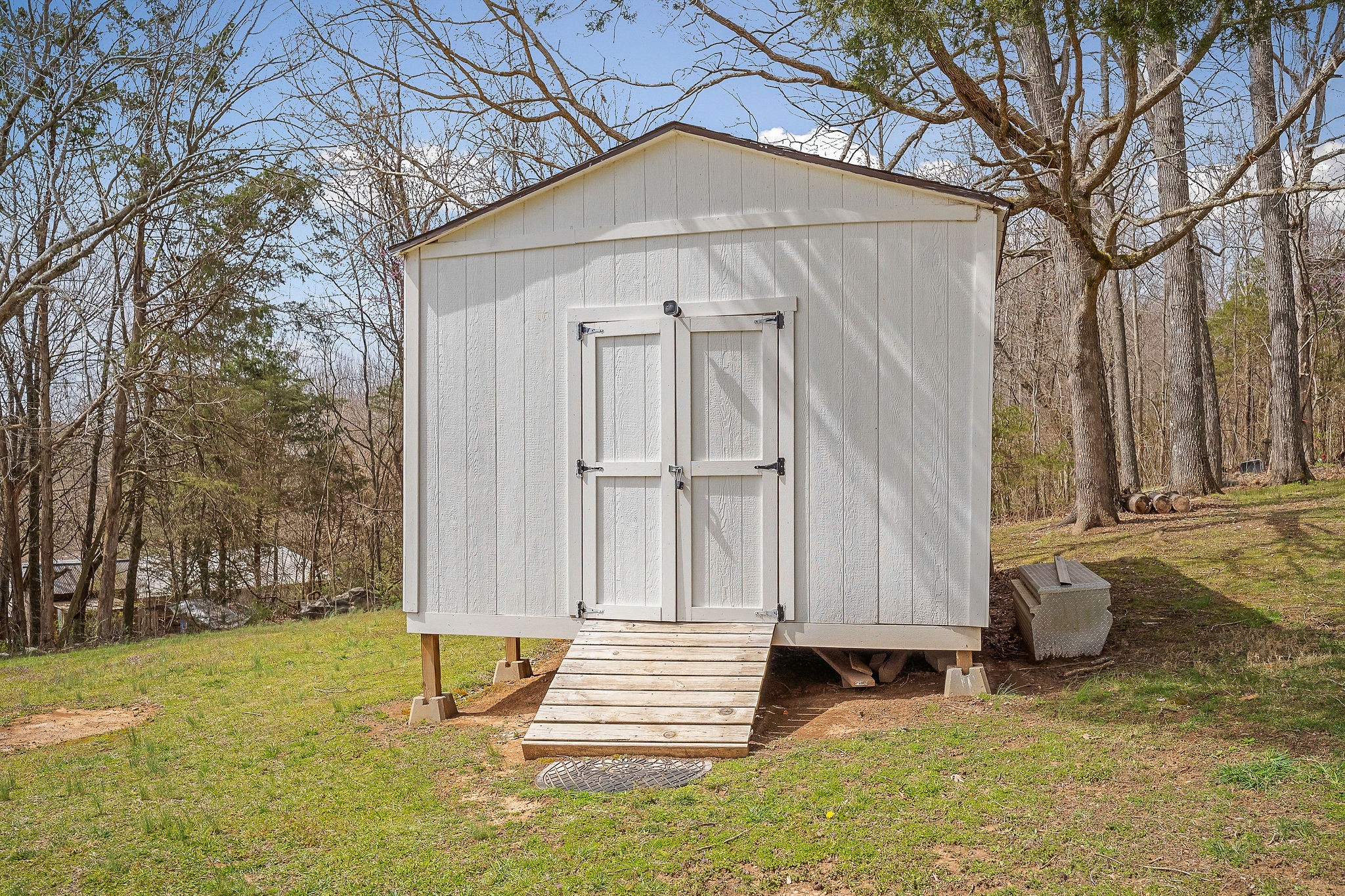 249 Darlene Drive Sparta, TN 38583 - Photo 18 of 21 a backyard of house with a table and chairs