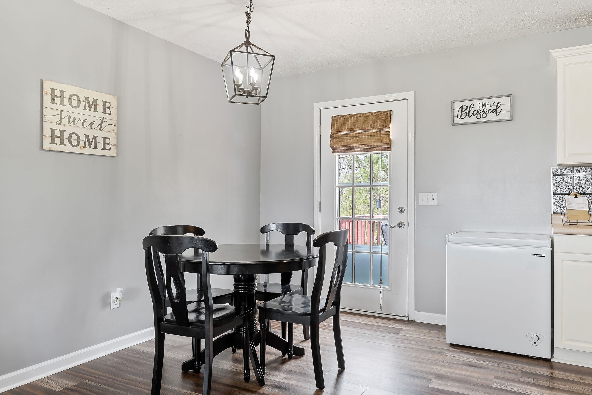 249 Darlene Drive Sparta, TN 38583 - Photo 8 of 21 a view of a dining room with furniture window and wooden floor