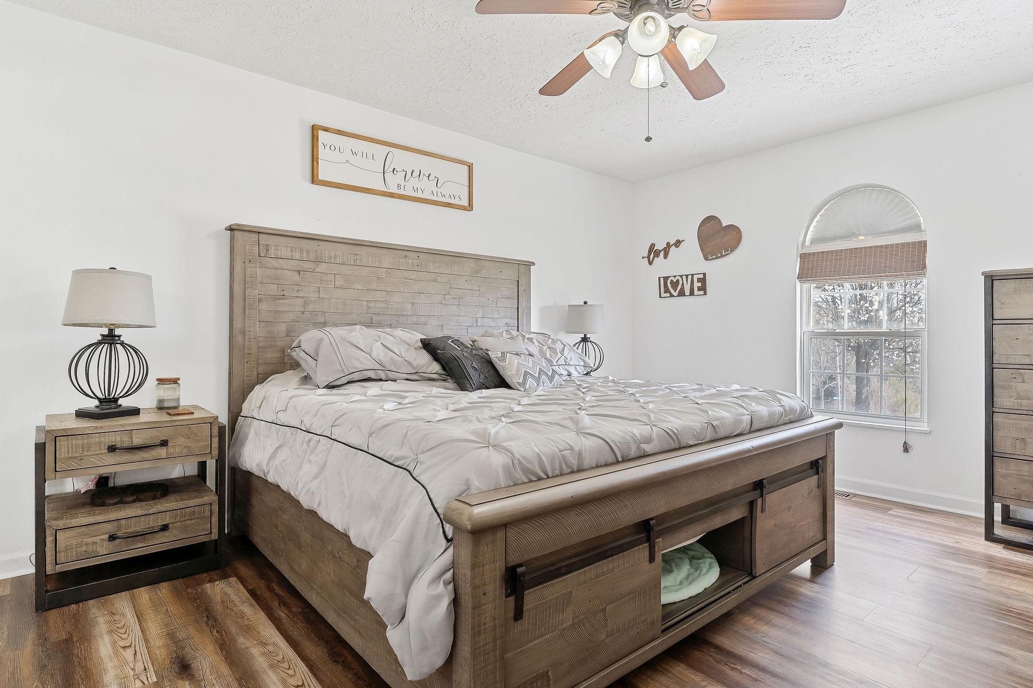 249 Darlene Drive Sparta, TN 38583 - Photo 9 of 21 a bedroom with a bed and a chandelier