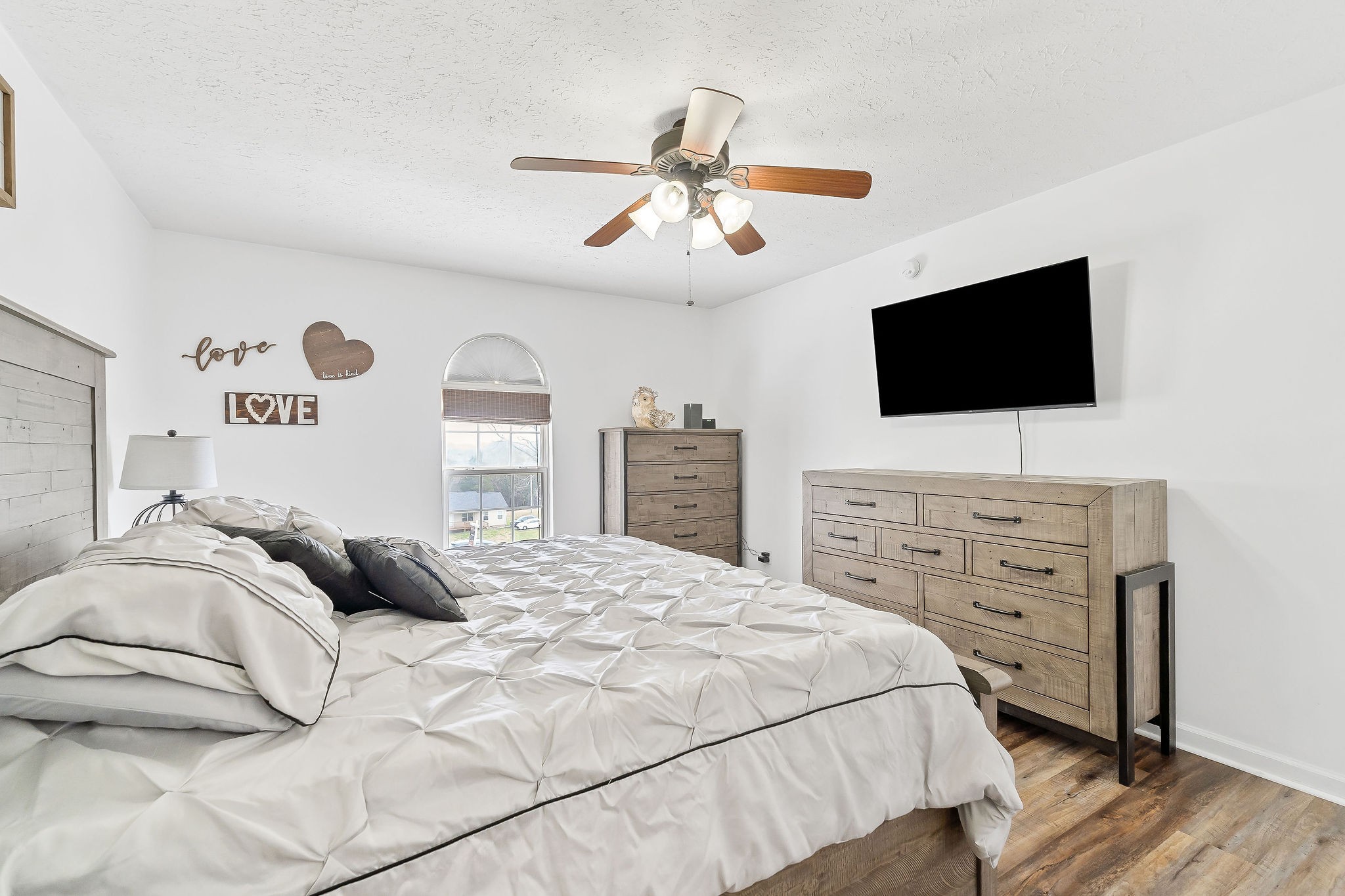 249 Darlene Drive Sparta, TN 38583 - Photo 10 of 21 a bedroom with a bed and a flat screen tv