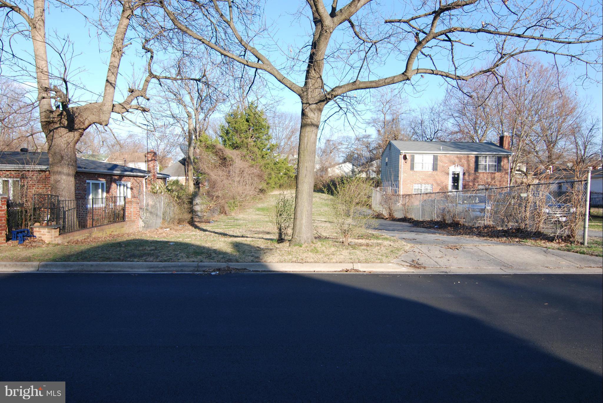 907 Cypresstree Drive Capitol Heights, MD 20743 - Photo 2 of 4 a view of a yard in front of a house