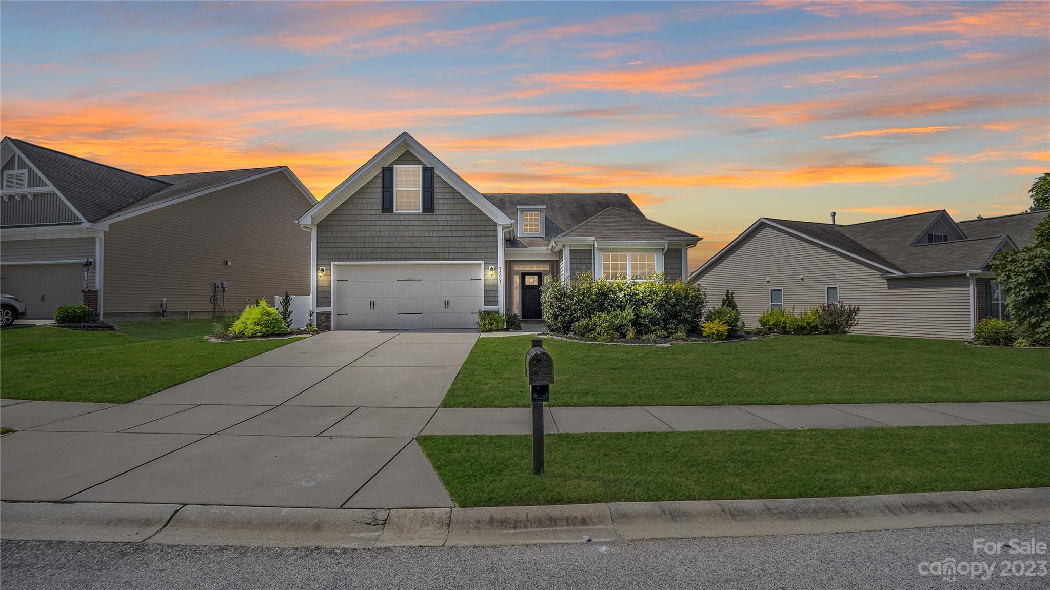 78005 Rillstone Drive Lancaster, SC 29720 - Photo 1 of 41 a front view of a house with a yard