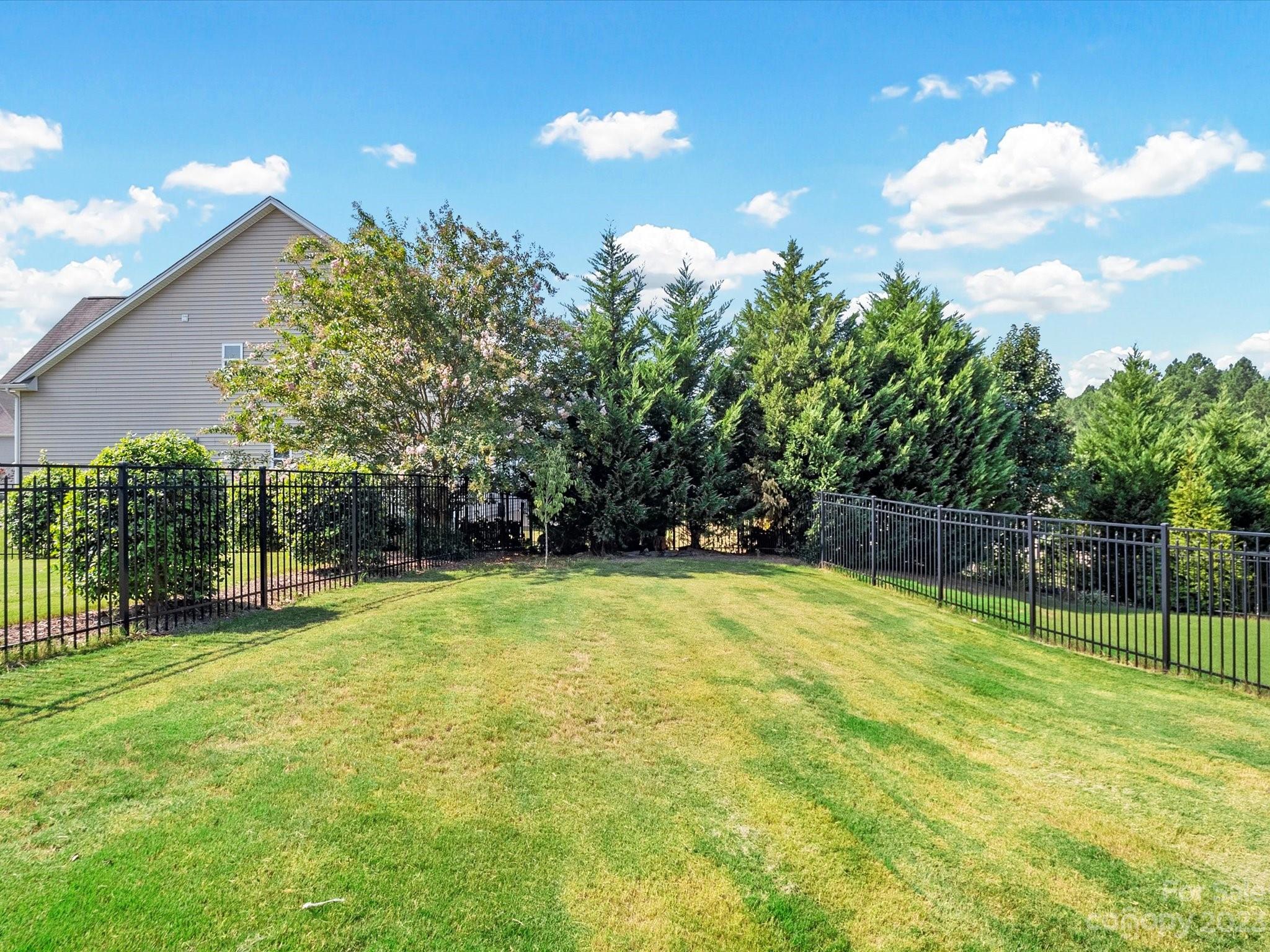 78005 Rillstone Drive Lancaster, SC 29720 - Photo 35 of 41 a swimming pool with an outdoor space and seating