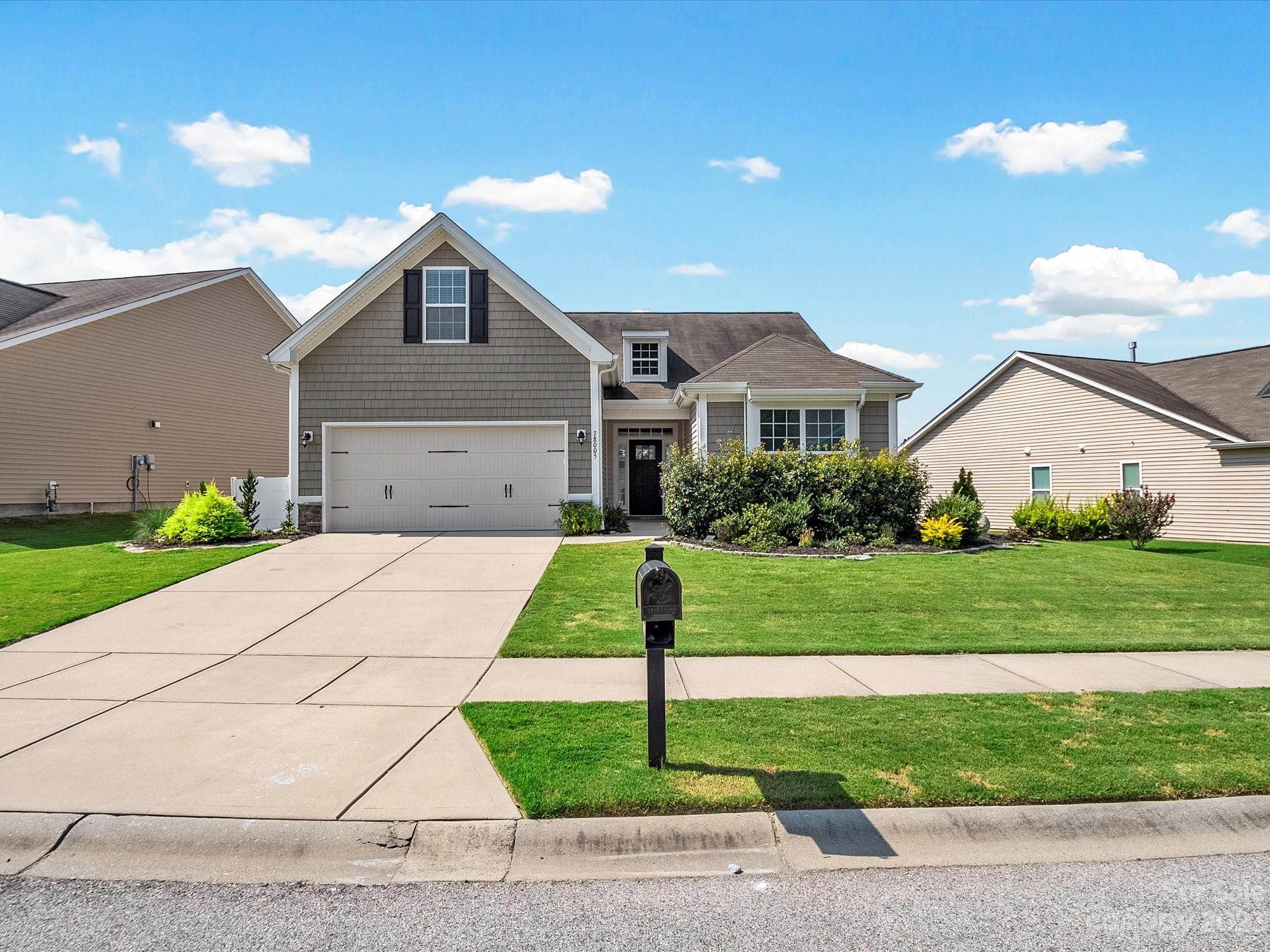 78005 Rillstone Drive Lancaster, SC 29720 - Photo 41 of 41 a front view of house with yard and green space