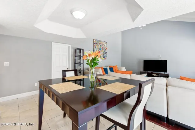a view of entryway with wooden floor and stairs