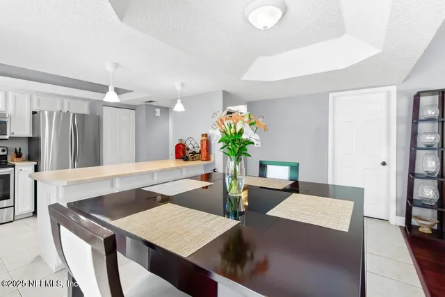 a bathroom with a sink and vanity
