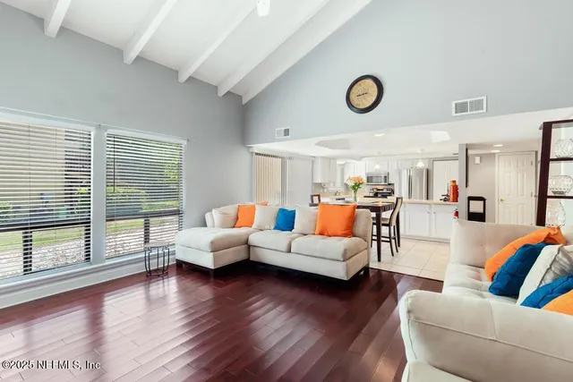 a bathroom that has a glass shower door