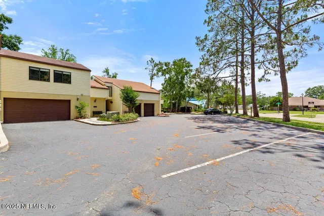 a view of a house with a street