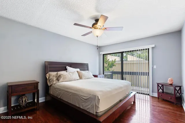 an aerial view of a house with outdoor space