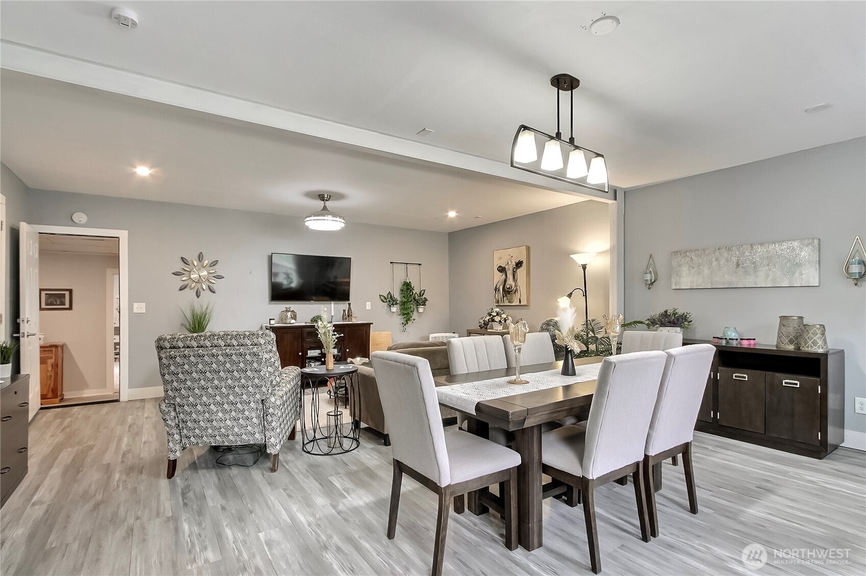 149 Barton Road Rochester, WA 98579 - Photo 21 of 36 a view of a dining room with furniture wooden floor and chandelier