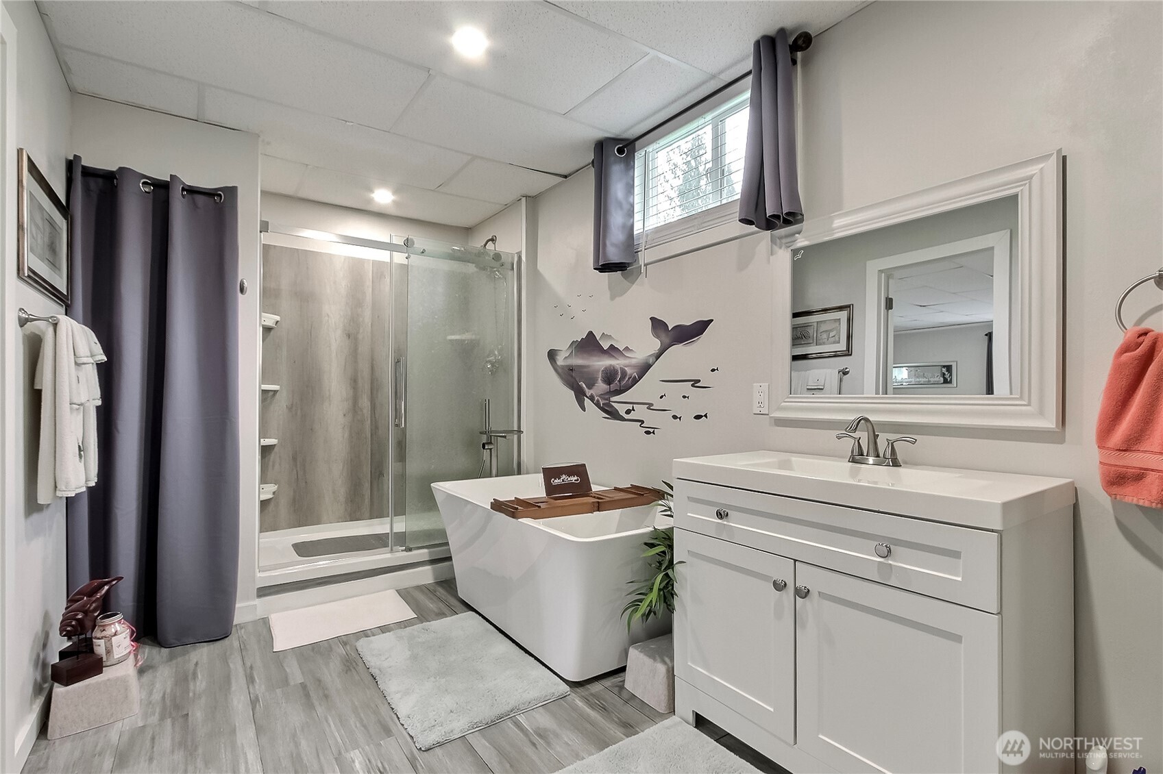 149 Barton Road Rochester, WA 98579 - Photo 28 of 36 a bathroom with a sink a toilet and a mirror