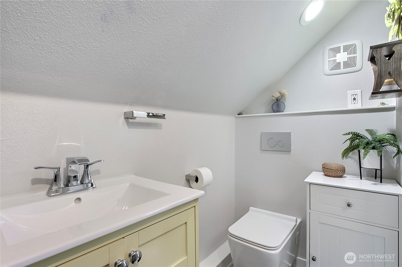 149 Barton Road Rochester, WA 98579 - Photo 32 of 36 a bathroom with a sink a toilet and mirror